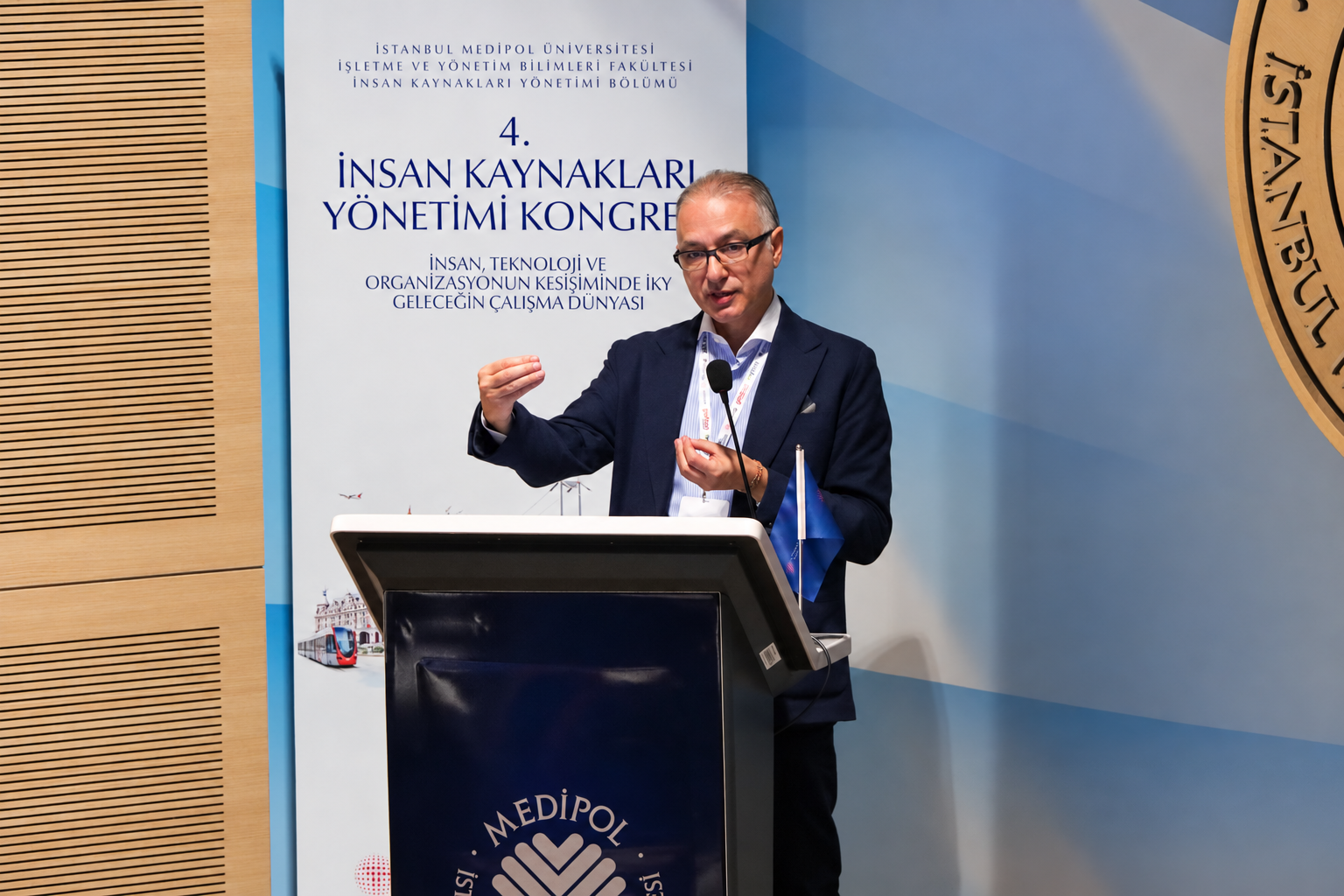 Speaker at university podium